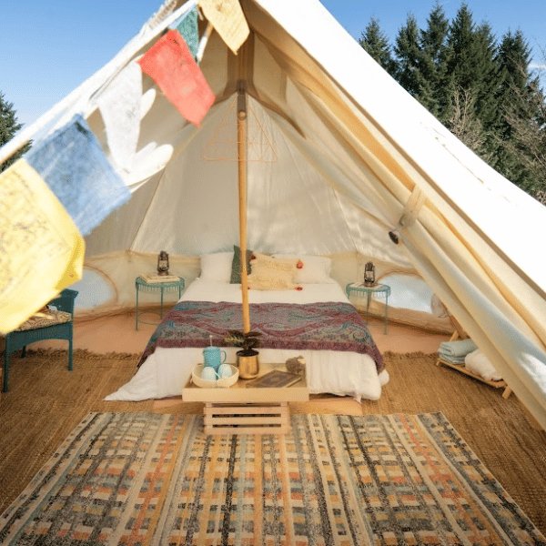 cozy bell tent decorated with bed tent and tent rug carpet