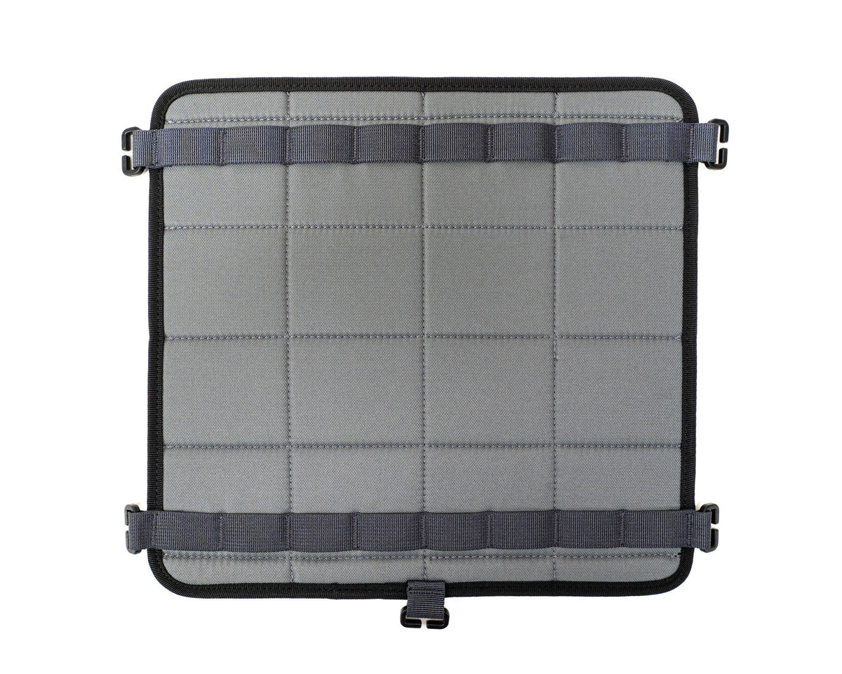Gray tactical panel with straps on a white background
