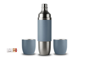A stainless steel and slate blue insulated wine bottle with two matching blue tumblers, shown on a clean white background. A small matchbox-style product tag is visible at the bottom left.