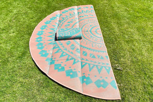 half circle rug for bell tent laying on lawn