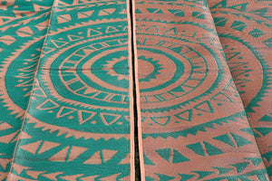 close up of bell tent rug with designs