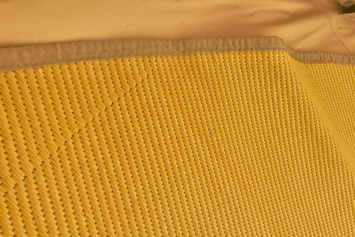 close up of poly rug with brown webbing