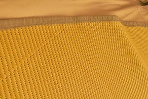 close up of poly rug with brown webbing