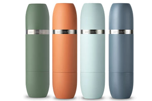 Four parkside 700 personal wine flasks in matte sage green, terracotta orange, pale mint, and slate blue, arranged in a row against a white background.