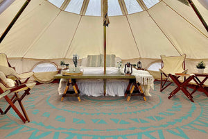 inside of yurt tent with rug