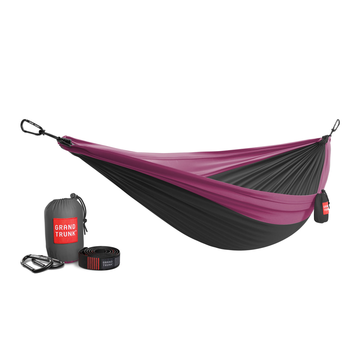 Purple and black hammock with carrying bag and straps on a white background