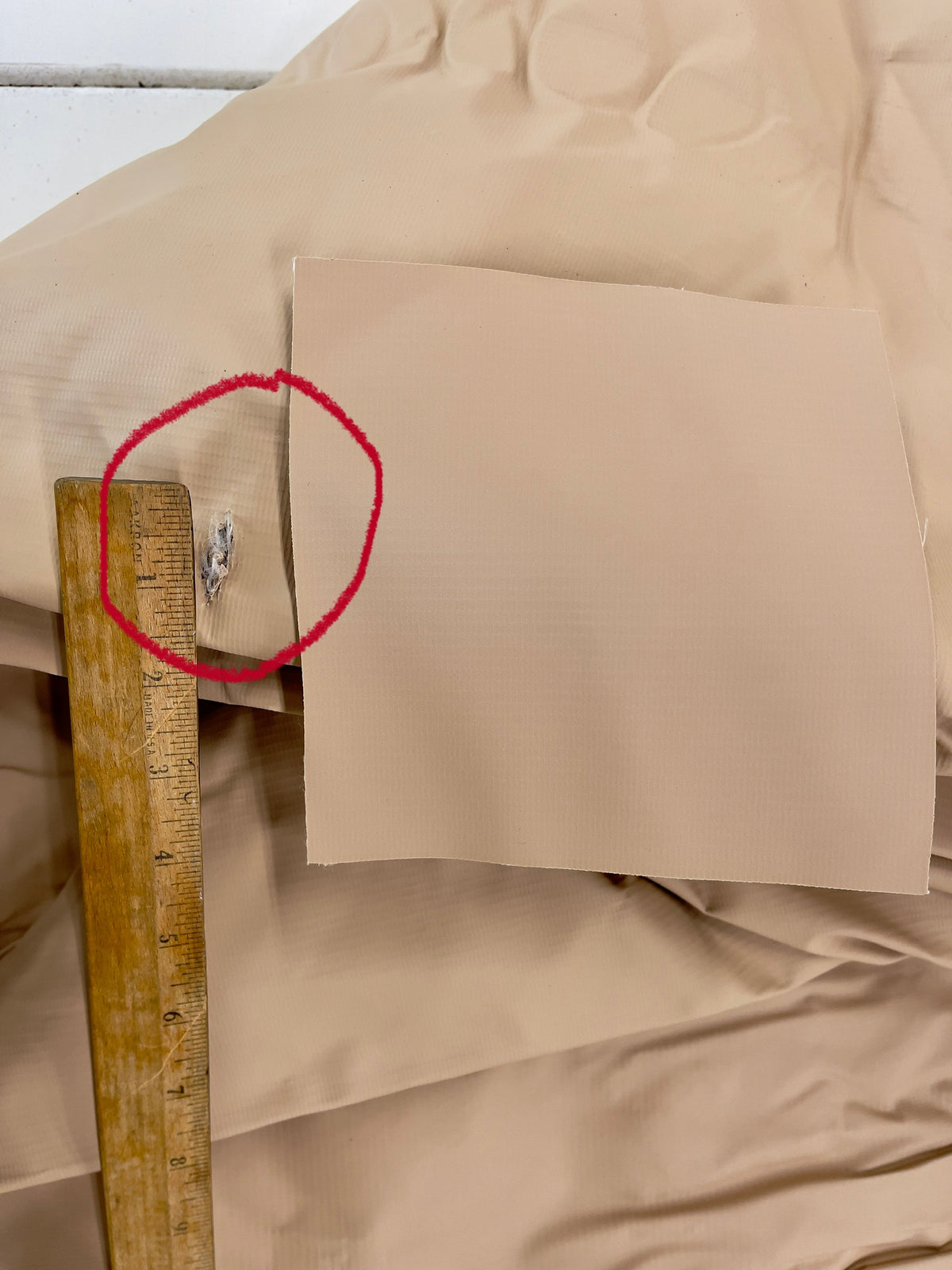 rip in vinyl tent floor