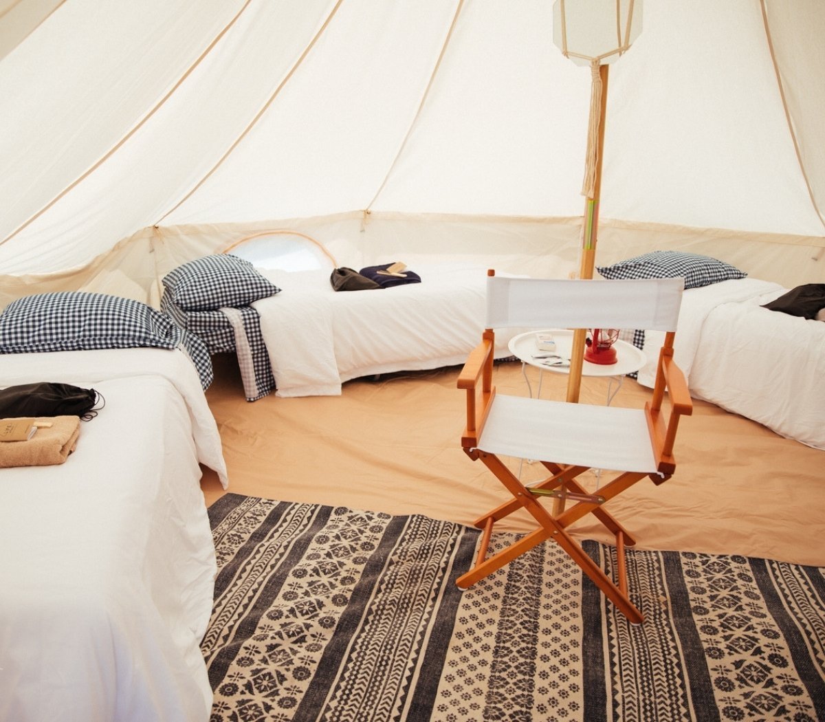 cots in canvas tent