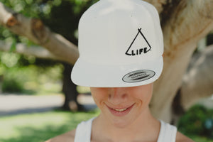 white hat on young man
