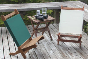 green and white camping chairs