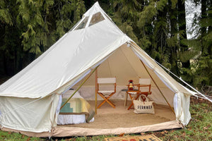 chairs and bag inside of luxury tent