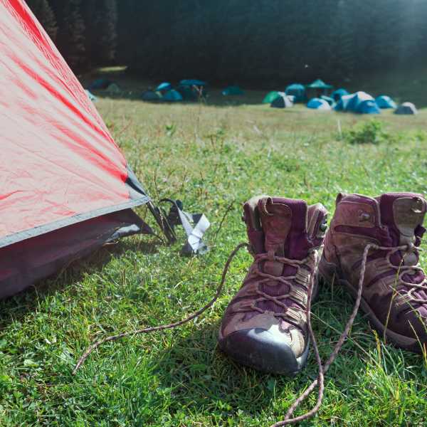 boots outside of a camping tent