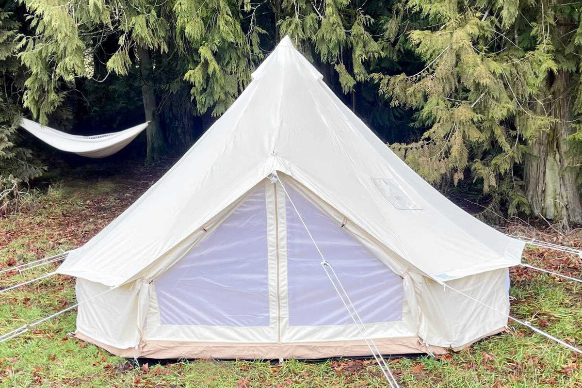 bell tent with hammock near trees