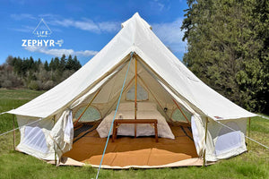 bell tent with queen bed inside