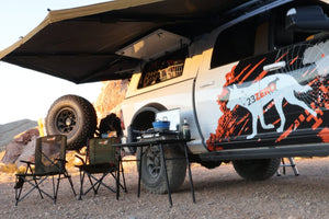 23 Zero overlanding truck with camping chairs
