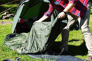 laying out sleeping bag