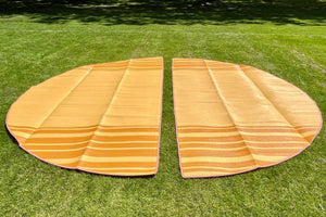2 halves of striped bell tent mattings