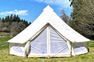 doors closed showing mesh screens of bell tent outside