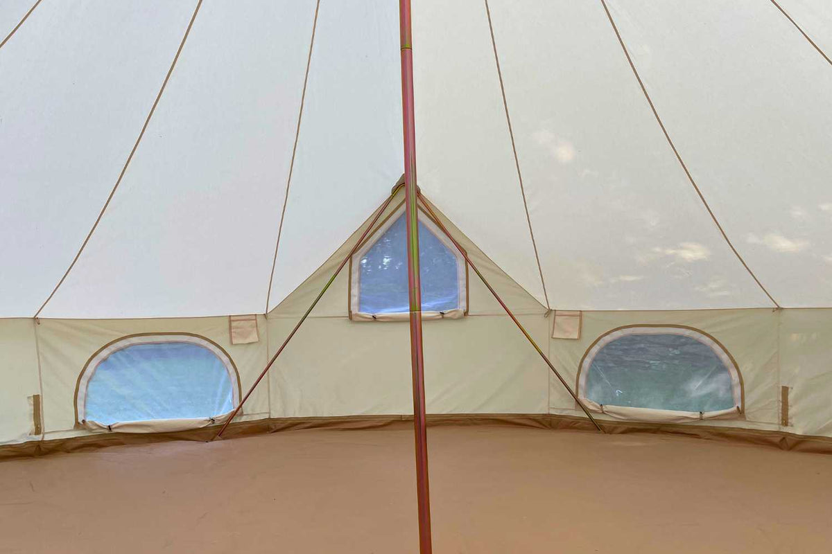 empty bell tent with windows open