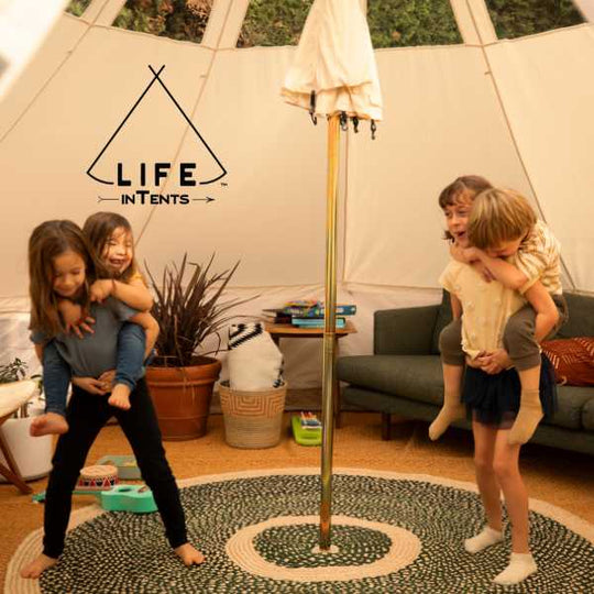 kids inside of camping tent having fun