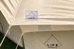 Close-up of a fly cover tent with 'LIFE INTENTS' branding