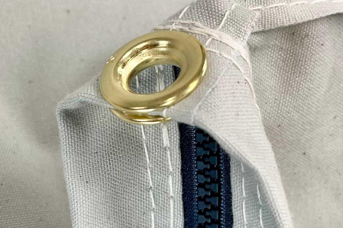grommet on canvas with zipper