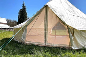 close up view of life intents 20 foot bell tent at  farm