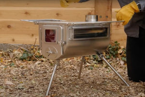 camping tent stove with man