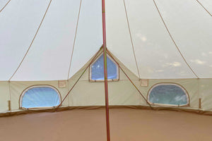 empty bell tent with windows open