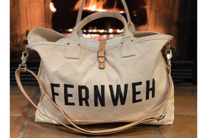 fernweh bag near fireplace