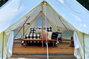 glamping tent with furniture inside