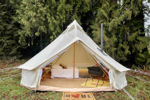 hunting tent with stove in woods