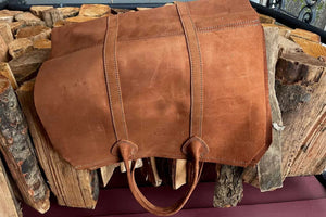 brown log carrier laying on wood