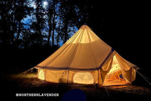 20 foot stargazer tent at night lit up